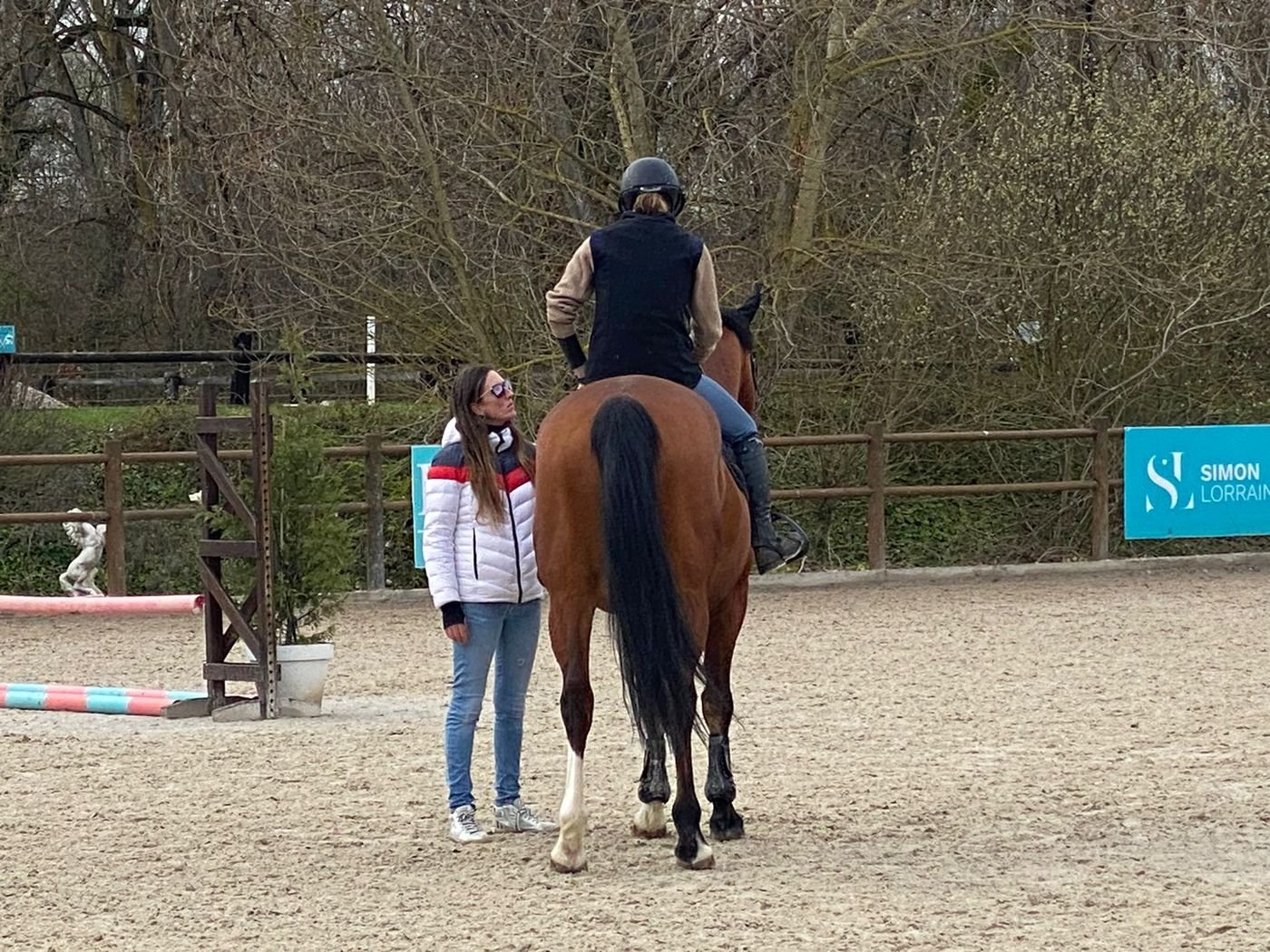 Kelly van Delft en séance à cheval avec une cavalière